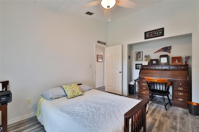 bedroom featuring hardwood / wood-style flooring and ceiling fan