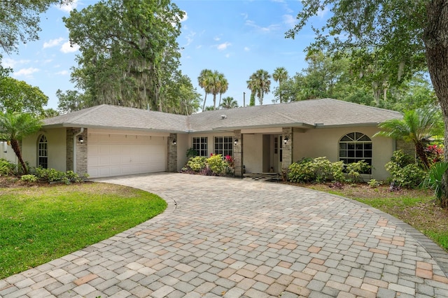 single story home featuring a garage