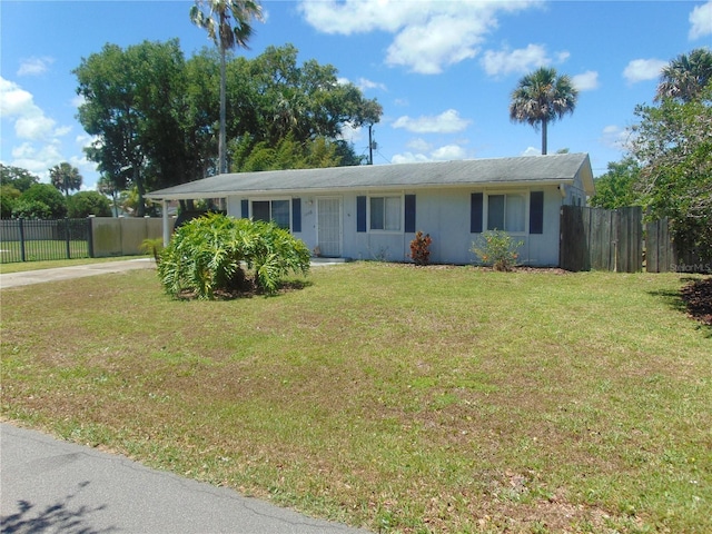 single story home with a front yard