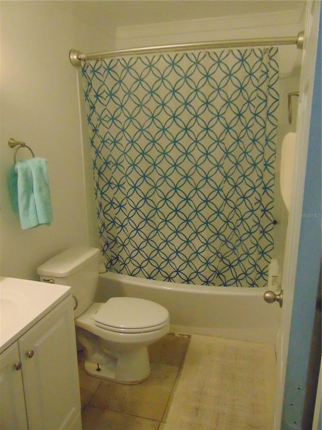 full bathroom with tile flooring, shower / bath combo, toilet, and vanity