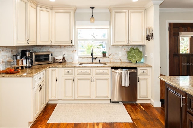 4606 Doris Dr, New Smyrna Beach, FL 32169 - kitchen featuring dishwasher, dark wood finished floors, light stone countertops, decorative backsplash, and ornamental molding