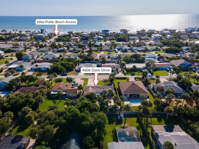4606 Doris Dr, New Smyrna Beach, FL 32169 - aerial overview of property's location featuring a nearby body of water and nearby suburban area