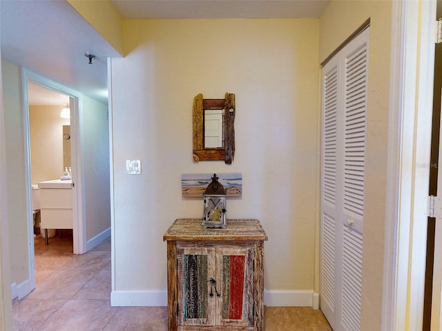 corridor with tile flooring