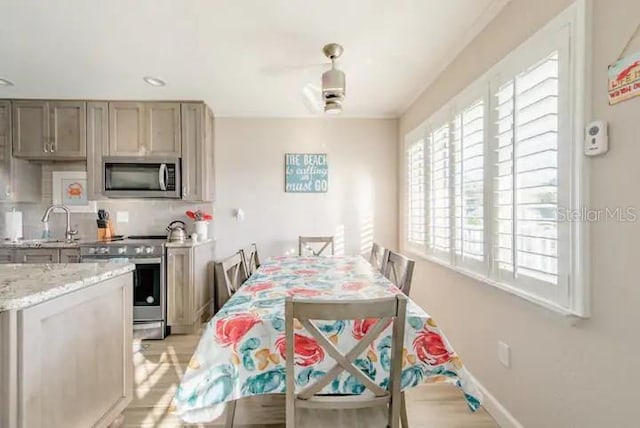 dining area featuring sink