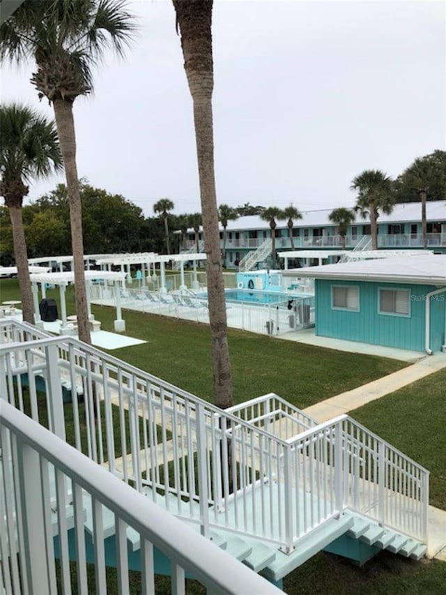 exterior space featuring a yard and a deck