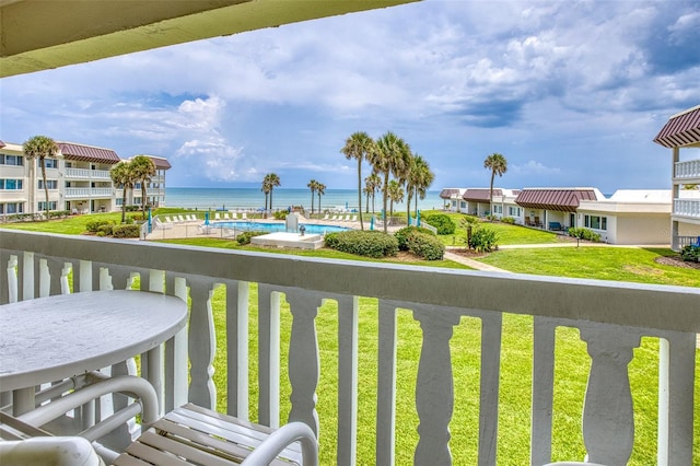 balcony featuring a water view