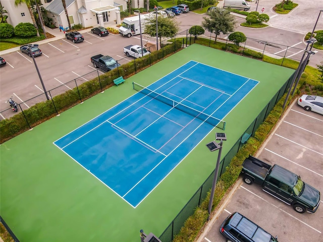 view of sport court featuring basketball hoop