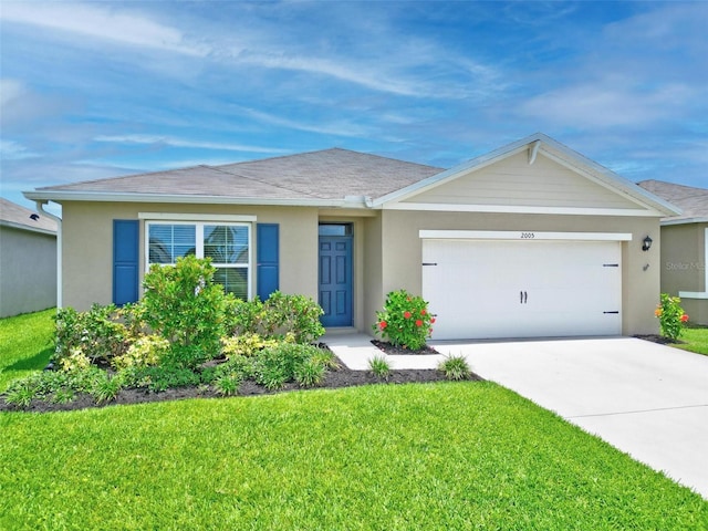 ranch-style house featuring a garage and a front lawn