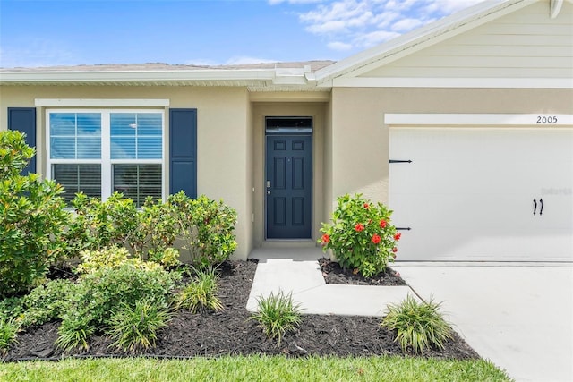 entrance to property featuring a garage