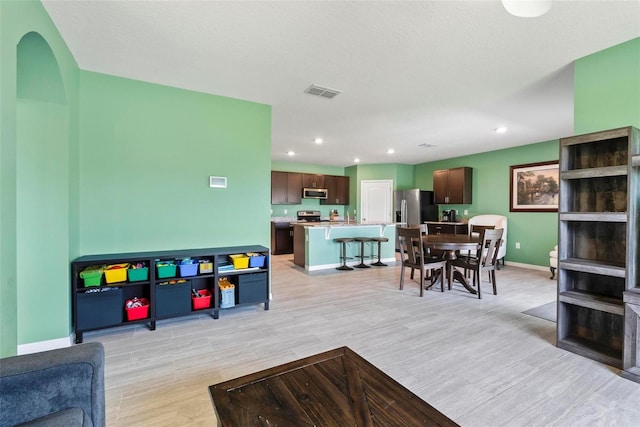 living room featuring light hardwood / wood-style flooring