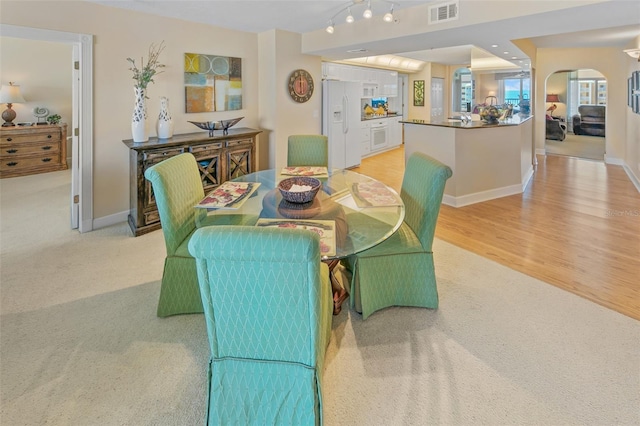 dining area featuring light hardwood / wood-style floors