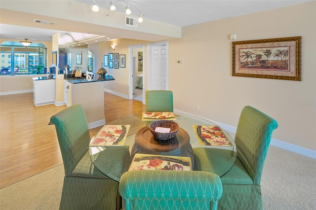 dining room featuring light hardwood / wood-style flooring