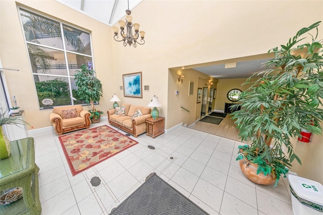 interior space with an inviting chandelier and light tile patterned flooring