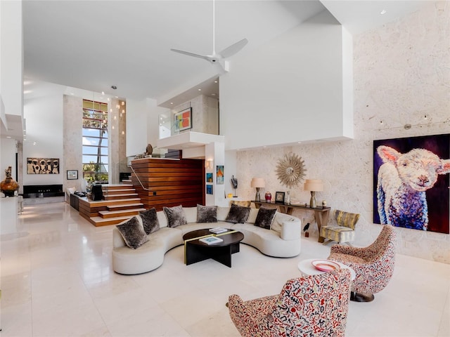 tiled living room with a high ceiling