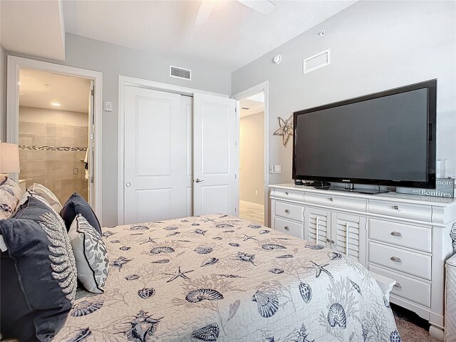 bedroom featuring visible vents, a closet, and ceiling fan