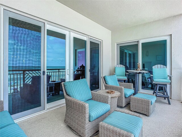 view of patio / terrace with a balcony