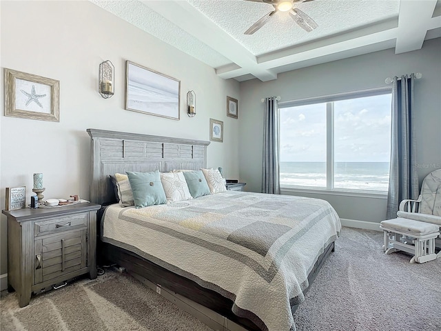 bedroom with baseboards, coffered ceiling, beam ceiling, a textured ceiling, and light colored carpet