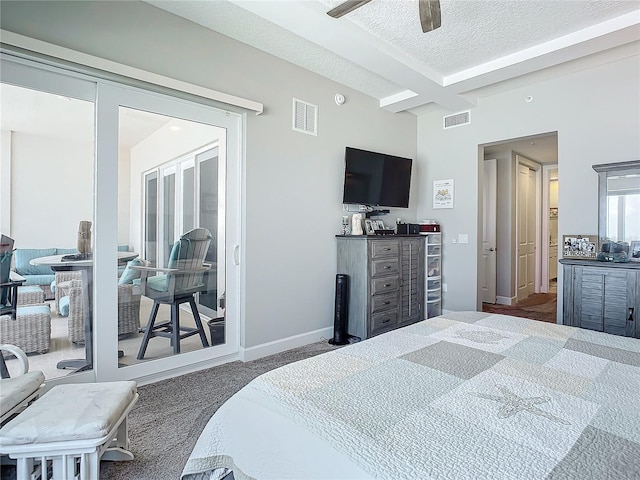 carpeted bedroom with visible vents, baseboards, a textured ceiling, and beam ceiling