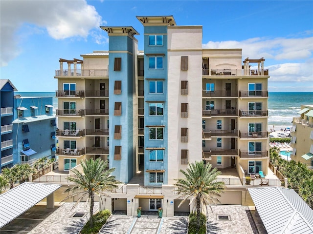 view of building exterior with a water view