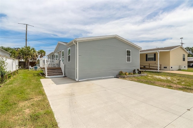 exterior space featuring a front lawn