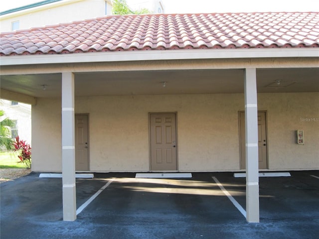 exterior space featuring a carport