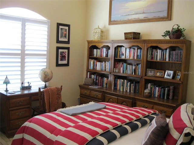 bedroom featuring multiple windows