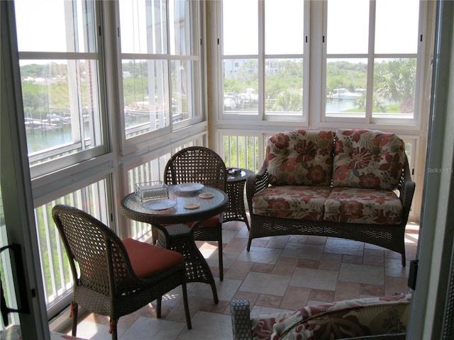 sunroom with a water view