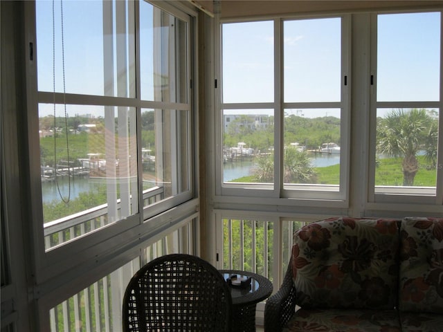 sunroom with a water view