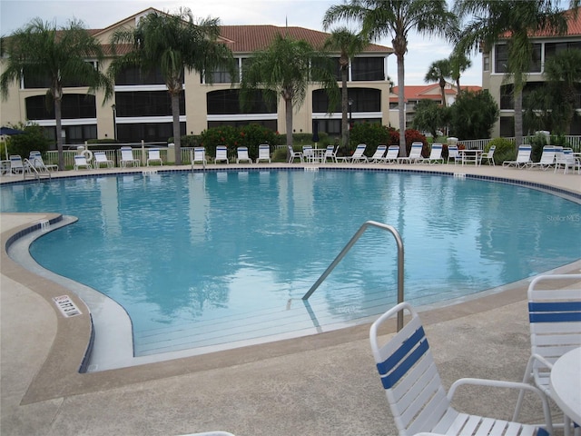 view of pool featuring a patio