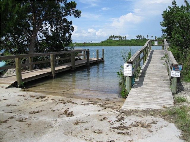 dock area featuring a water view