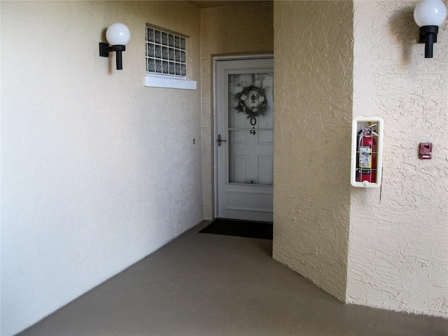 434 Bouchelle Dr Unit 304, New Smyrna Beach, FL 32169 - entrance to property featuring stucco siding