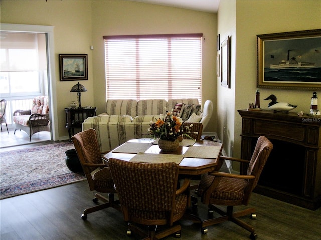 434 Bouchelle Dr Unit 304, New Smyrna Beach, FL 32169 - dining room with wood finished floors and vaulted ceiling