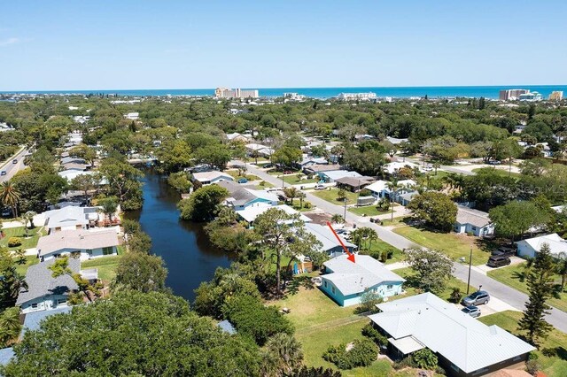 bird's eye view with a water view