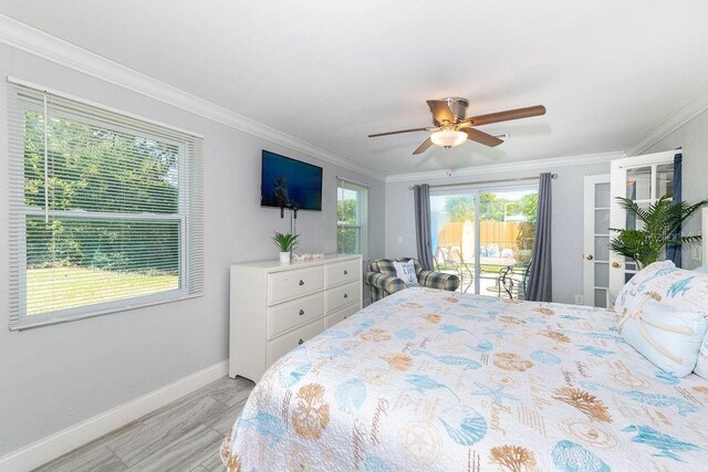 bedroom featuring access to exterior, ceiling fan, and ornamental molding