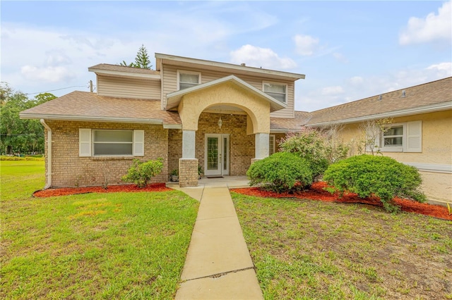 split level home featuring a front yard