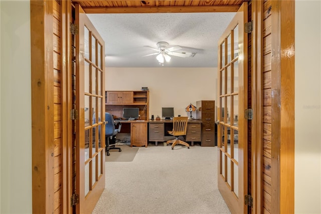 office featuring light carpet and french doors