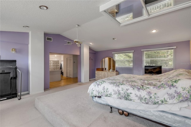 carpeted bedroom featuring ceiling fan and lofted ceiling