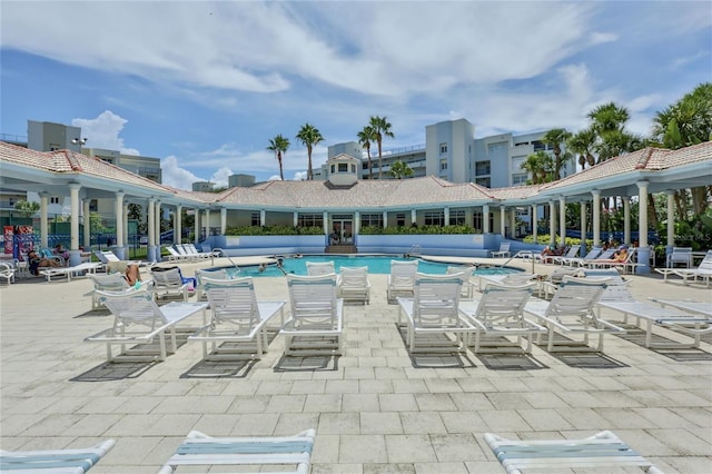 view of pool featuring a patio