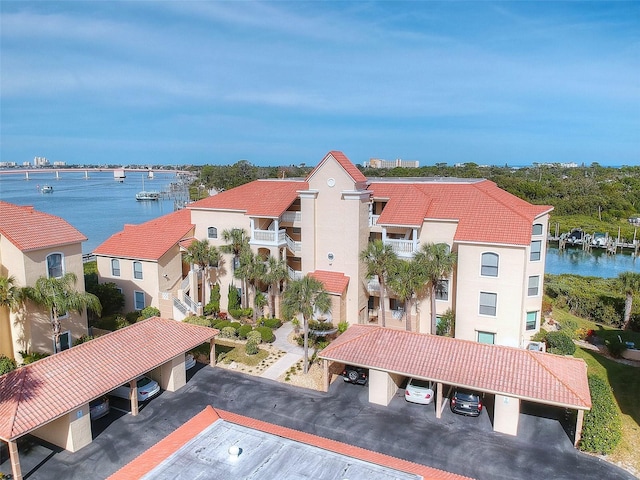 drone / aerial view with a water view