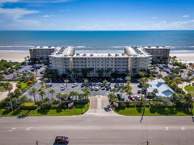 aerial view with a beach view and a water view