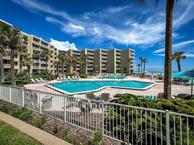 view of swimming pool featuring a patio area