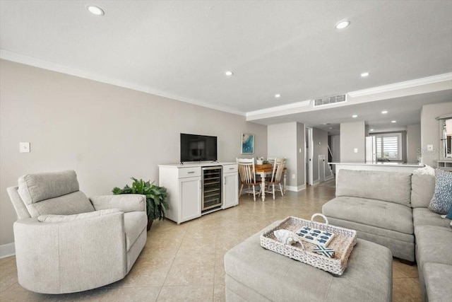 living room featuring wine cooler and crown molding