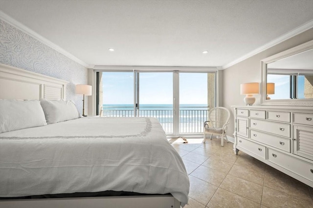 tiled bedroom with access to outside, a water view, multiple windows, and crown molding