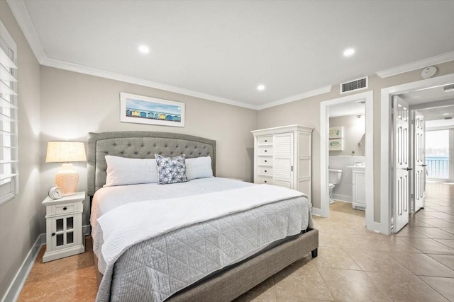 bedroom featuring ensuite bath, light tile patterned flooring, and ornamental molding