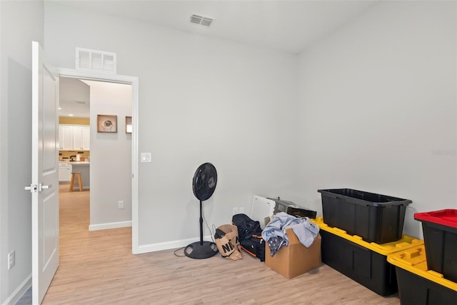 miscellaneous room with light hardwood / wood-style flooring