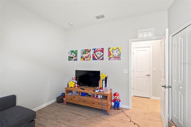 game room featuring light hardwood / wood-style flooring