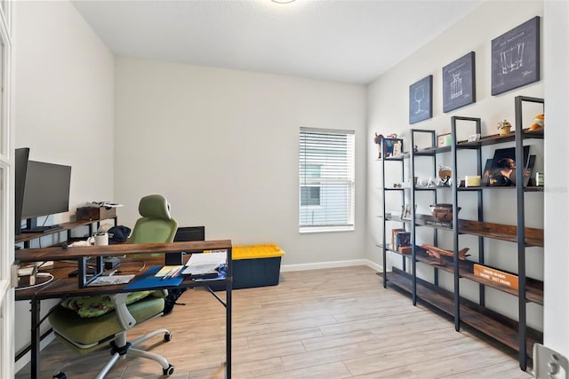 office area featuring light hardwood / wood-style floors