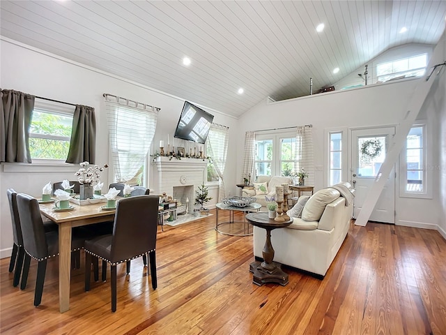 living room featuring wood ceiling, lofted ceiling, and hardwood / wood-style flooring