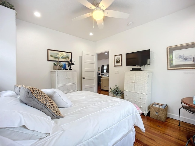 bedroom featuring ceiling fan and hardwood / wood-style flooring