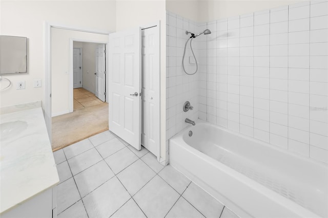 full bath with shower / washtub combination, tile patterned flooring, and vanity